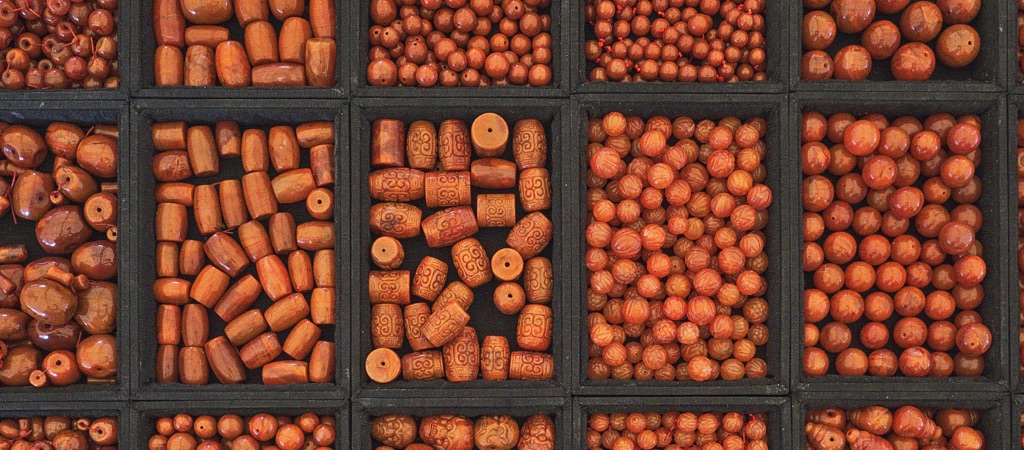 Different brown pearls, each nicely ordered in their own box